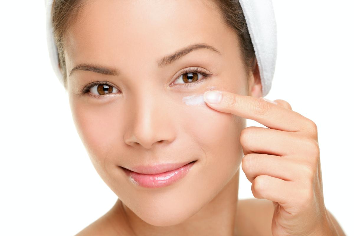applying eye cream