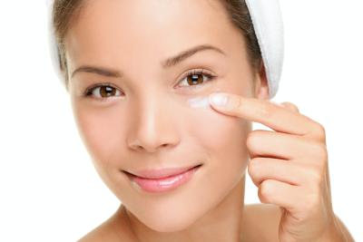 applying eye cream